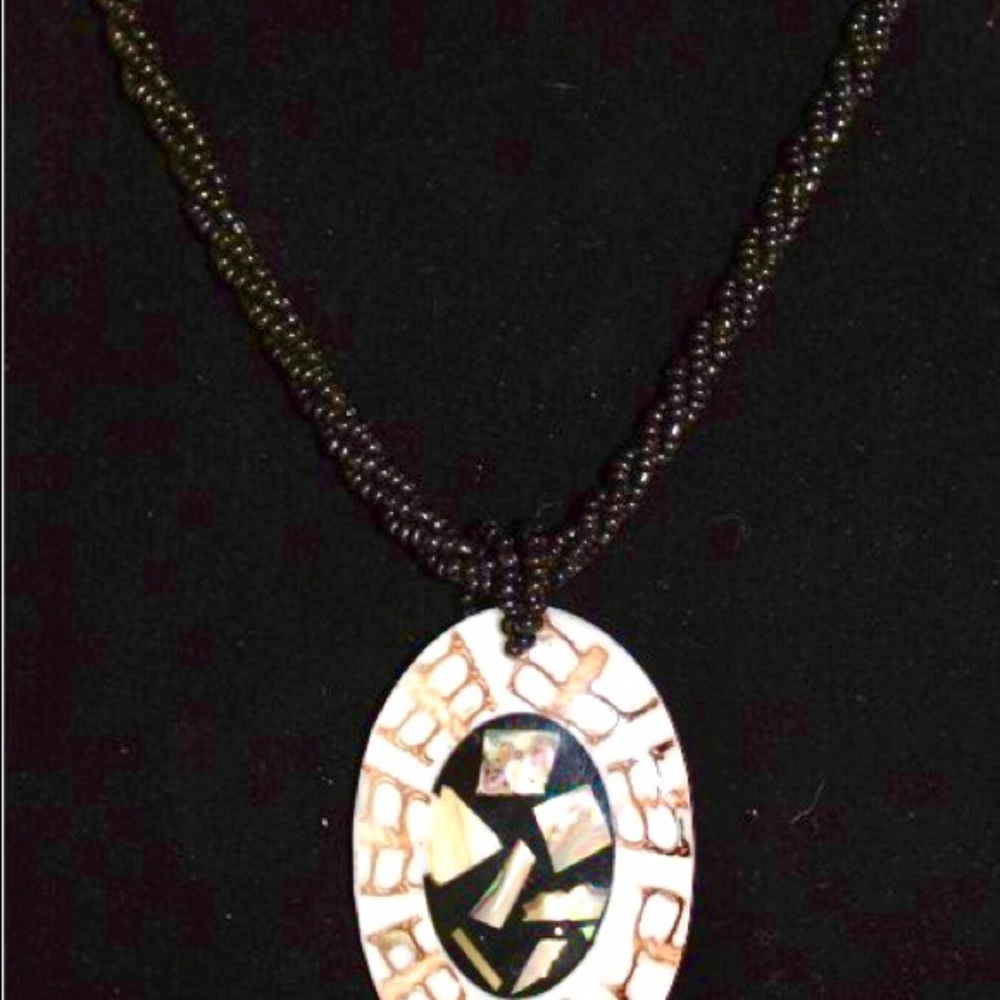 Beautiful Beaded necklace with resin shell pendant